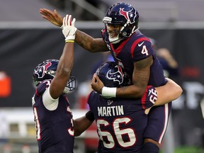 Texans quarterback Deshaun Watson isn’t happy with his team’s management after it didn’t give Eric Bieniemy an interview for their head coaching job.
