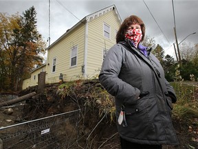 A local developer, George Saade, dug a 12-foot pit within one to two feet of Wendy Richards' house recently, destabilizing her historic 1886 home in Manotick.