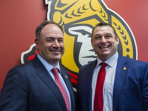 The Ottawa Senators' Pierre Dorion (left) and  D.J. Smith shown at a press conference, May 23, 2019.