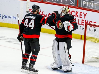 Senators defenceman Erik Gudbranson is the first to congratulate goaltender Matt Murray for Friday night's victory.