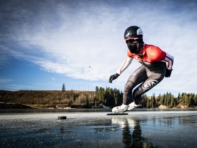 Speed skater Jordan Belchos rounds a tight turn while training on Ghost Lake near Cochrane, Alta., earlier in the winter.