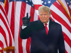 U.S. President Donald Trump gestures during a rally to contest the certification of the 2020 U.S. presidential election results by the U.S. Congress, in Washington, D.C, Wednesday, Jan. 6, 2021.