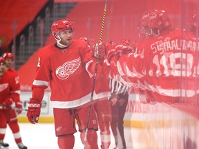 Detroit Red Wings forward Bobby Ryan is congratulated by teammates after scoring a goal against the Columbus Blue Jackets on Monday. Ryan scored both goals in Detroit's 3-2 loss.