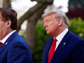 My Pillow CEO Michael Lindell speaks as U.S. President Donald Trump listens during a daily coronavirus response briefing in the Rose Garden at the White House in Washington, U.S., March 30, 2020.