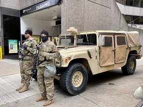 Members of the National Guard are seen in downtown Washington on Friday.