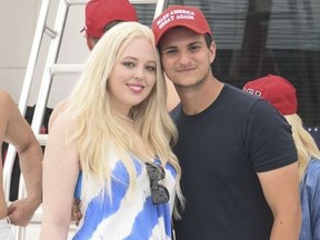 Tiffany Trump and her boyfriend Michael Poulos attend the Trump fundraising flotilla in Montauk, NY.