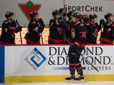 Senators winger Nick Paul (13) accepts congratulations from teammates after scoring the first goal of the game against the Maple Leafs.
