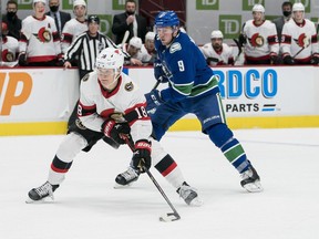 Vancouver Canucks forward J.T. Miller tracks down Ottawa Senators forward Tim Stuetzle in the second period on Jan. 25, 2021.