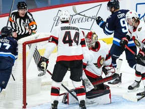 Winnipeg Jets forward Andrew Copp scores against Ottawa Senators goalie Marcus Hogberg during the third period at Bell MTS Place on Saturday.