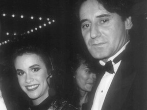 Alanis Morissette in October 1990 at the World Exchange Plaza Opening with MCA vice-president John Alexander.