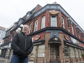 John Borsten stands in front of the former Fish Market Restaurant building that he has purchased.