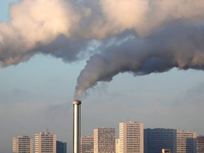 Smokestacks billow at an incineration plant near Paris, France, Dec. 18, 2019.