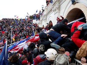 Pro-Trump protesters storm into the U.S. Capitol during clashes with police, during a rally to contest the certification of the 2020 U.S. presidential election results by the U.S. Congress, in Washington on Wednesday.