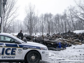 Gatineau police were on the scene of an over night fire at 808 Rue Saint Louis in Gatineau, Sunday Feb. 28, 2021. Significant damage was caused by the fire that took 60 firefighters and 19 trucks to get it under control.