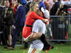 Patrick Mahomes of the Kansas City Chiefs celebrates with Brittany Matthews after defeating the San Francisco 49ers in Super Bowl LIV at Hard Rock Stadium in Februaruy 2020 in Miami.