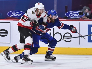 Connor Brown of the Senators skates against Jeff Petry of the Canadiens during the first period.