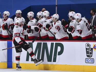 Connor Brown of the Senators celebrates after tipping the puck past Canadiens netminder Carey Price for a goal in the second period on Thursday night.