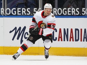 Evgenii Dadonov of the Senators celebrates his game-winning goal in overtime against the Maple Leafs, Feb. 15, 2021.