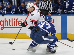 Thomas Chabot of the Ottawa Senators evades Pierre Engvall of the Toronto Maple Leafs at Scotiabank Arena on Feb. 15, 2021 in Toronto.
