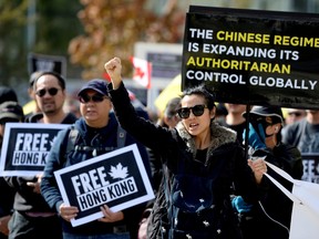 Supporters hold a rally in solidarity with Hong Kong protesters, in Vancouver, Sept. 29, 2019.