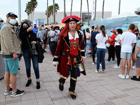 A general view of NFL fans on the Tampa Riverwalk outside the NFL Experience prior to Super Bowl LV with the Tampa Bay Buccaneers playing against the Kansas City Chiefs in Tampa, Fla., Feb. 6, 2021.