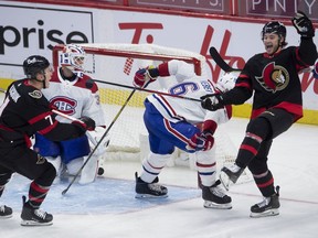 Ottawa Senators left wing Brady Tkachuk (7) races to congratulate teammate centre Josh Norris, right, as he celebrates his goal while Montreal Canadiens goaltender Jake Allen and defenceman Shea Weber (6) looks on during third period NHL action Sunday February 21, 2021 in Ottawa.