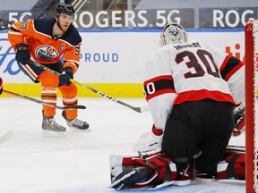 Ottawa Senators goaltender Matt Murray makes a save against Edmonton Oilers forward Connor McDavid during the first period at Rogers Place, January 31, 2021.