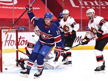 Canadiens right-winger Brendan Gallagher (11) celebrates his first-period goal against Senators netminder Matt Murray (30).