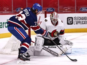 Senators goaltender Matt Murray makes a save in front of Canadiens right-winger Tyler Toffoli during the third period.