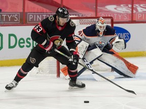 Ottawa Senators right wing Evgenii Dadonov controls the puck in front of Edmonton Oilers goalie Mike Smith in the second period at the Canadian Tire Centre on Monday.