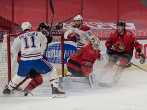 Canadiens right-winger Brendan Gallagher (11) is unable to find the puck after the initial save is made by the Senators' Matt Murray (30) in the first period of Saturday's game at Canadian Tire Centre.