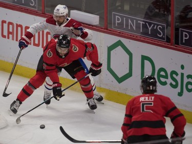 Feb 6, 2021; Ottawa, Ontario, CAN; Ottawa Senators defenseman Artem Zub (2) controls the puck in front of Montreal Canadiens left wing Tomas Tatar (90) in the third period at the Canadian Tire Centre. Mandatory Credit: Marc DesRosiers-USA TODAY Sports ORG XMIT: IMAGN-445092