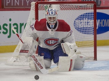 Canadiens goalie Jake Allen (34) makes a save against the Senators in the second period.