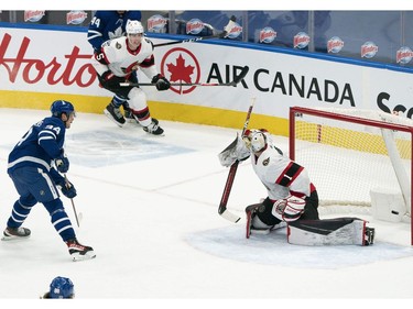 Toronto Maple Leafs center Auston Matthews scores a goal on Ottawa Senators goaltender Marcus Hogberg during the second period at Scotiabank Arena on Monday.