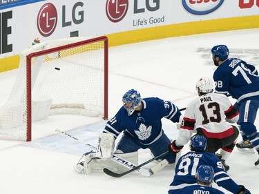 Feb 15, 2021; Toronto, Ontario, CAN; 
Ottawa Senators left wing Nick Paul scores a goal on Toronto Maple Leafs goaltender Frederik Andersen during the second period at Scotiabank Arena on Monday.