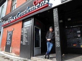 Phil Bentivoglio stands in front of his two businesses on York Street in Ottawa Thursday. Phil owns both the Bare Fax Gentlemen's Club and 27 Club and talks about the headaches that rising insurance premiums and denials of insurance are causing local bars.