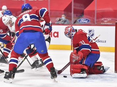 Carey Price of the Canadiens makes a pad save against the Senators during the first period of Tuesday's game in Montreal.