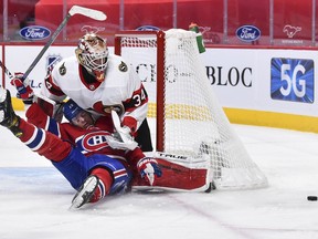 Jesperi Kotkaniemi of the Canadiens crashes into Senators goaltender Joey Daccord during the second period.