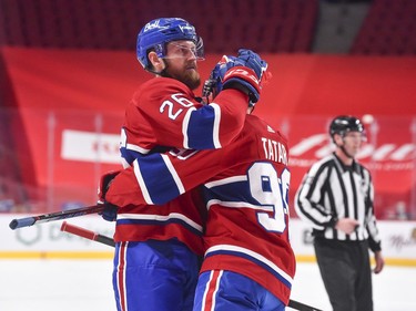 Jeff Petry of the Canadiens celebrates his second-period oal with teammate Tomas Tatar. It turned out to be the game-winning score against the Senators.