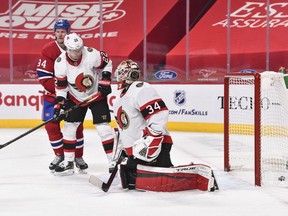 Senators goaltender Joey Daccord concedes a goal to the Canadiens during the second period, March 2, 2021.