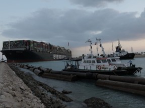 Stranded ship Ever Given, one of the world's largest container ships, is seen after it ran aground, in Suez Canal, Egypt, March 28, 2021.