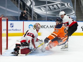 Ottawa Senators goaltender Joey Daccord stops Connor McDavid of the Edmonton Oilers, March 8, 2021