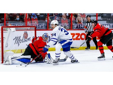 Maple Leafs centre Auston Matthews os foiled on an overtime scoring attempt by Senators goalie Anton Forsberg.