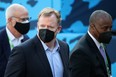 NFL commissioner Roger Goodell looks on while wearing a mask before Super Bowl LV.