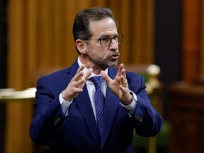 Bloc Quebecois leader Yves-Francois Blanchet gestures as he speaks during Question Period, as efforts continue to help slow the spread of COVID-19, in the House of Commons on Parliament Hill in Ottawa, Feb. 24, 2021.