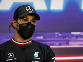 Second placed qualifier, Lewis Hamilton of Great Britain and Mercedes GP talks during a Press Conference after qualifying ahead of the F1 Grand Prix of Bahrain at Bahrain International Circuit on March 27, 2021 in Bahrain.