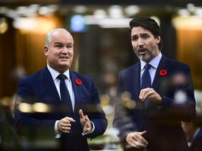 Erin O'Toole (left) and Justin Trudeau.