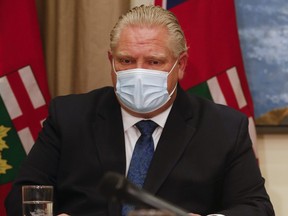 Ontario Premier Doug Ford on a conference call at Queen's Park on Friday, Feb. 26, 2021.