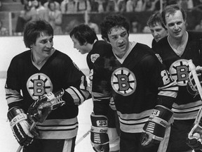 Bobby Schmautz of the Boston Bruins (left) and his teammates celebrate a goal during the 1979 Stanley Cup playoffs.



(CP PICTURE ARCHIVE/stf) ORG XMIT: 608001