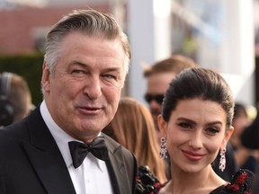 Actor Alec Baldwin (L) and wife Hilaria Baldwin walk the red carpet at the 25th Annual Screen Actors Guild Awards at the Shrine Auditorium in Los Angeles on January 27, 2019.
